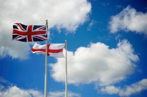 The British and English flags. Photo Cred: CC Wikipedia